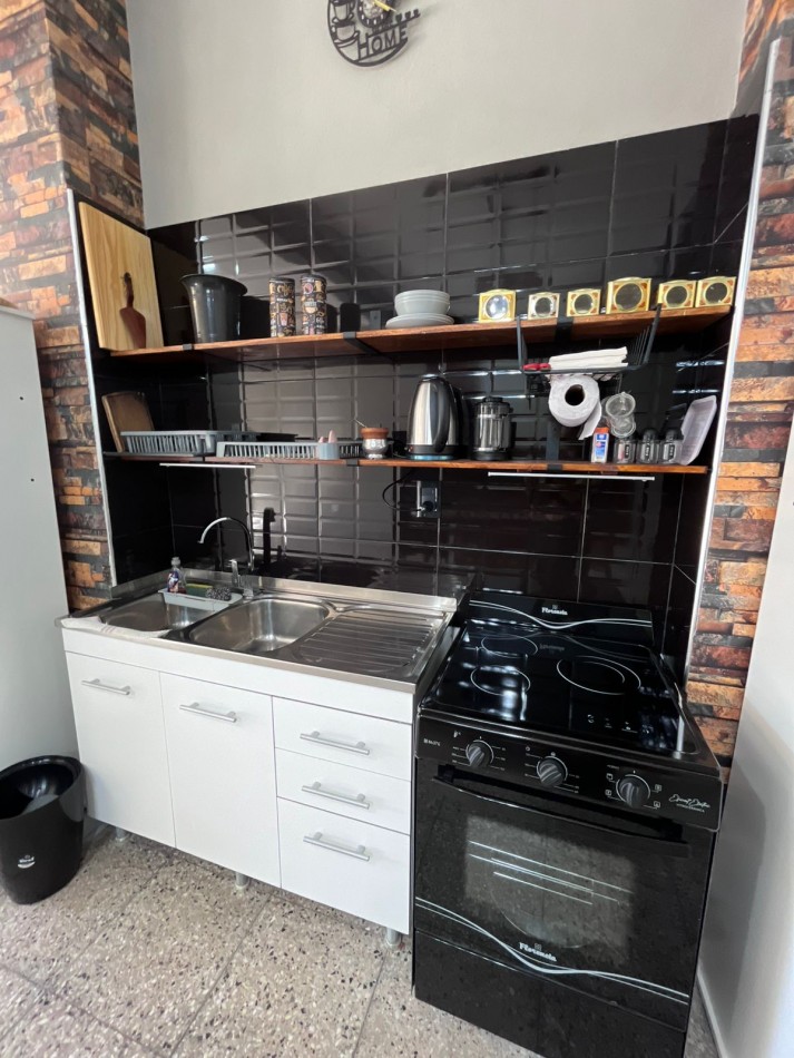 LOCAL TRANFORMADO A VIVIENDA